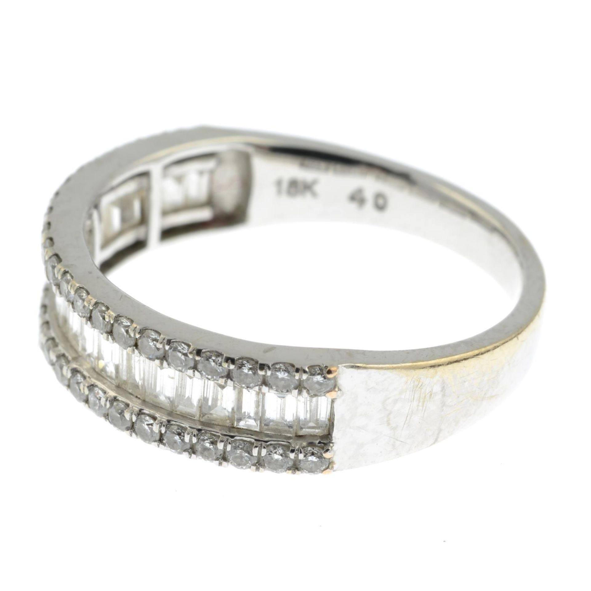 An 18ct gold baguette and brilliant-cut diamond dress ring.Total diamond weight 0.40ct, - Image 2 of 3