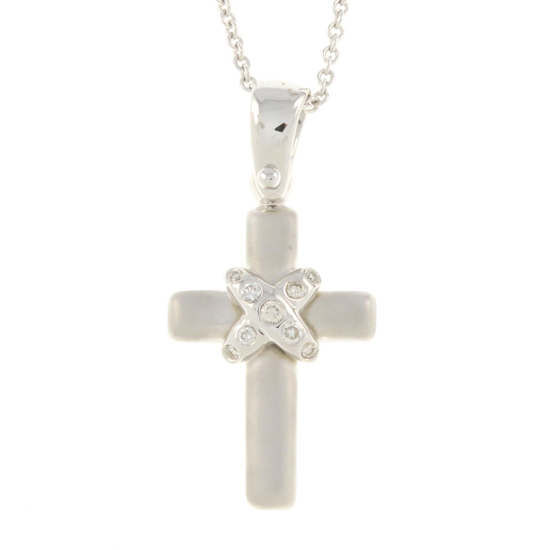 A brilliant-cut diamond cross pendant,