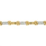 A brilliant-cut diamond bi-colour bracelet,