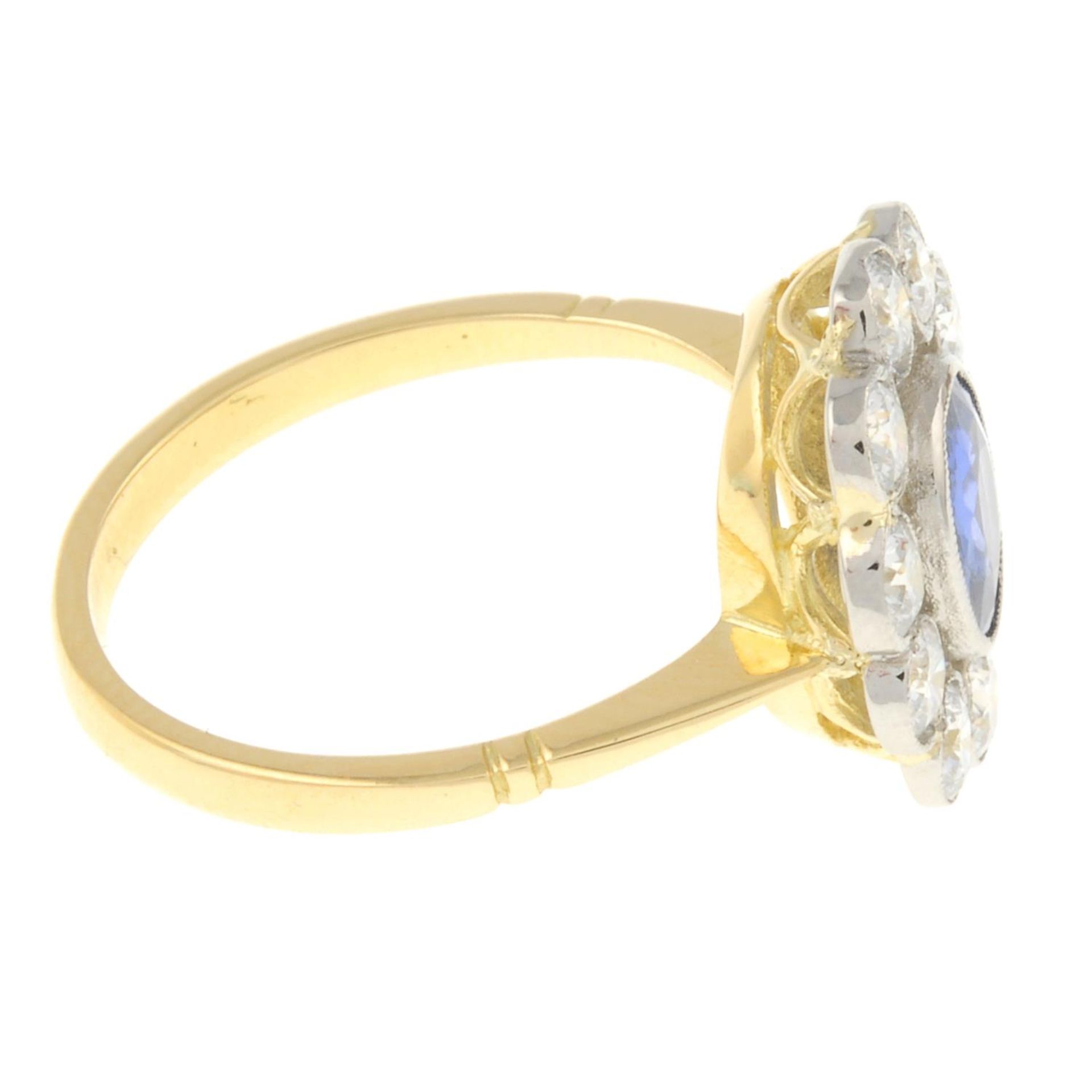 A sapphire and brilliant-cut diamond cluster ring.Sapphire weight 0.80ct.Estimated total diamond - Image 3 of 4