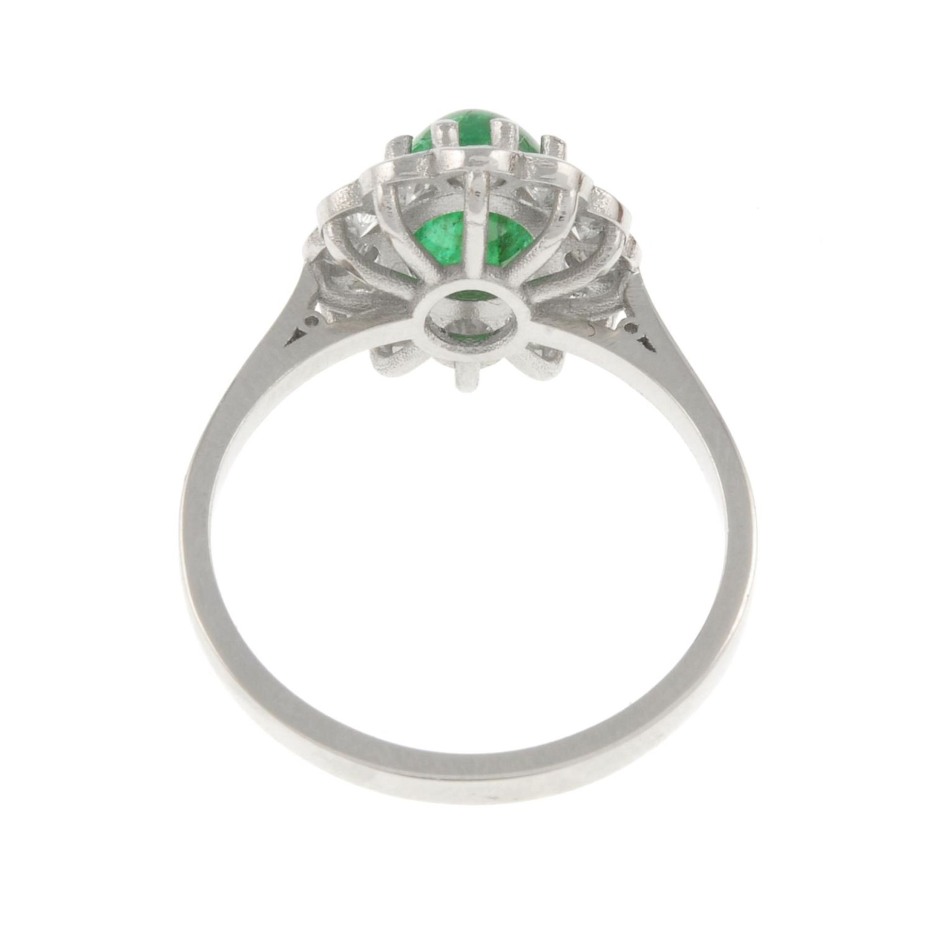 An emerald cabochon and brilliant-cut diamond cluster ring.Emerald calculated weight 1.57ct, - Image 4 of 4