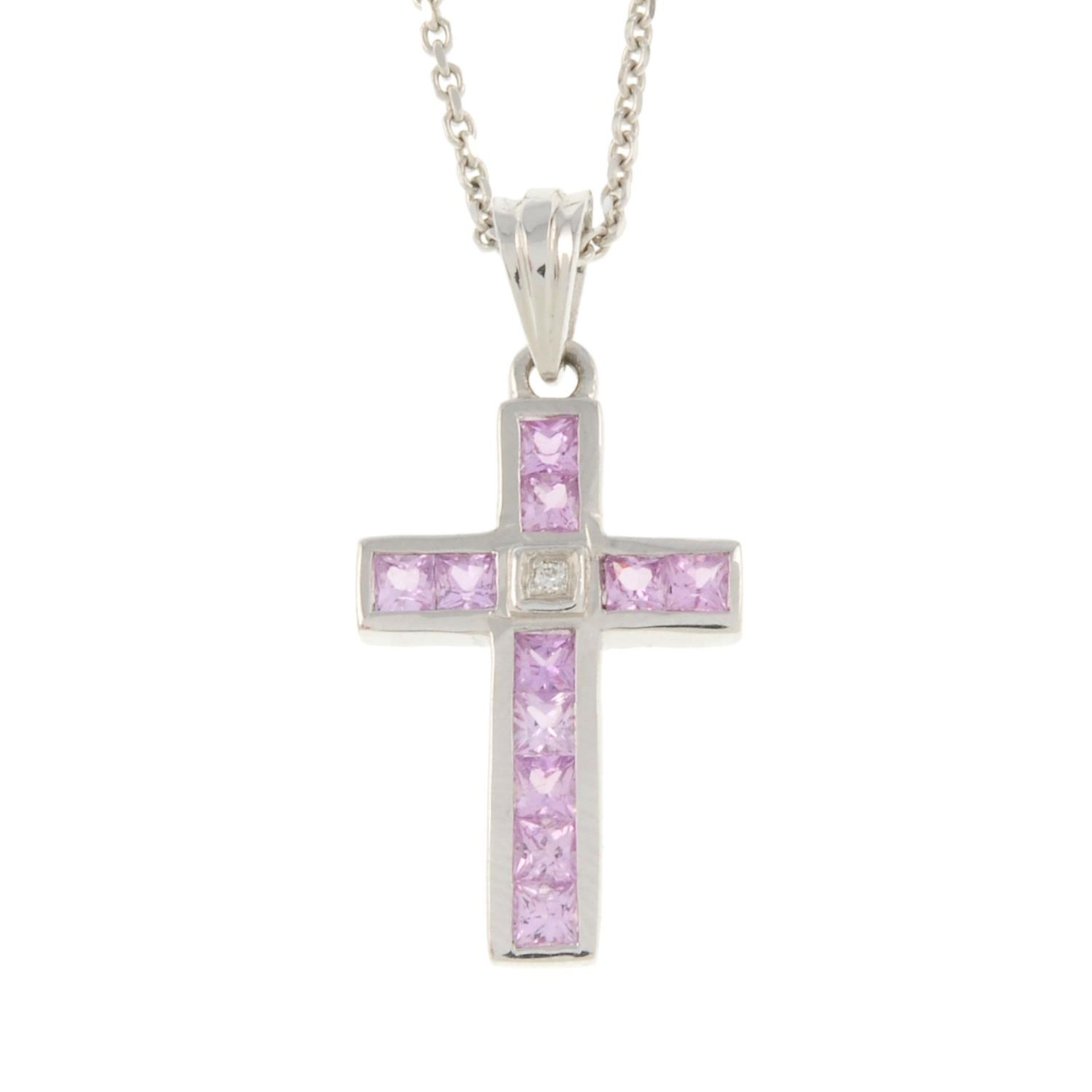 An 18ct gold pink sapphire and square-shape diamond cross pendant,