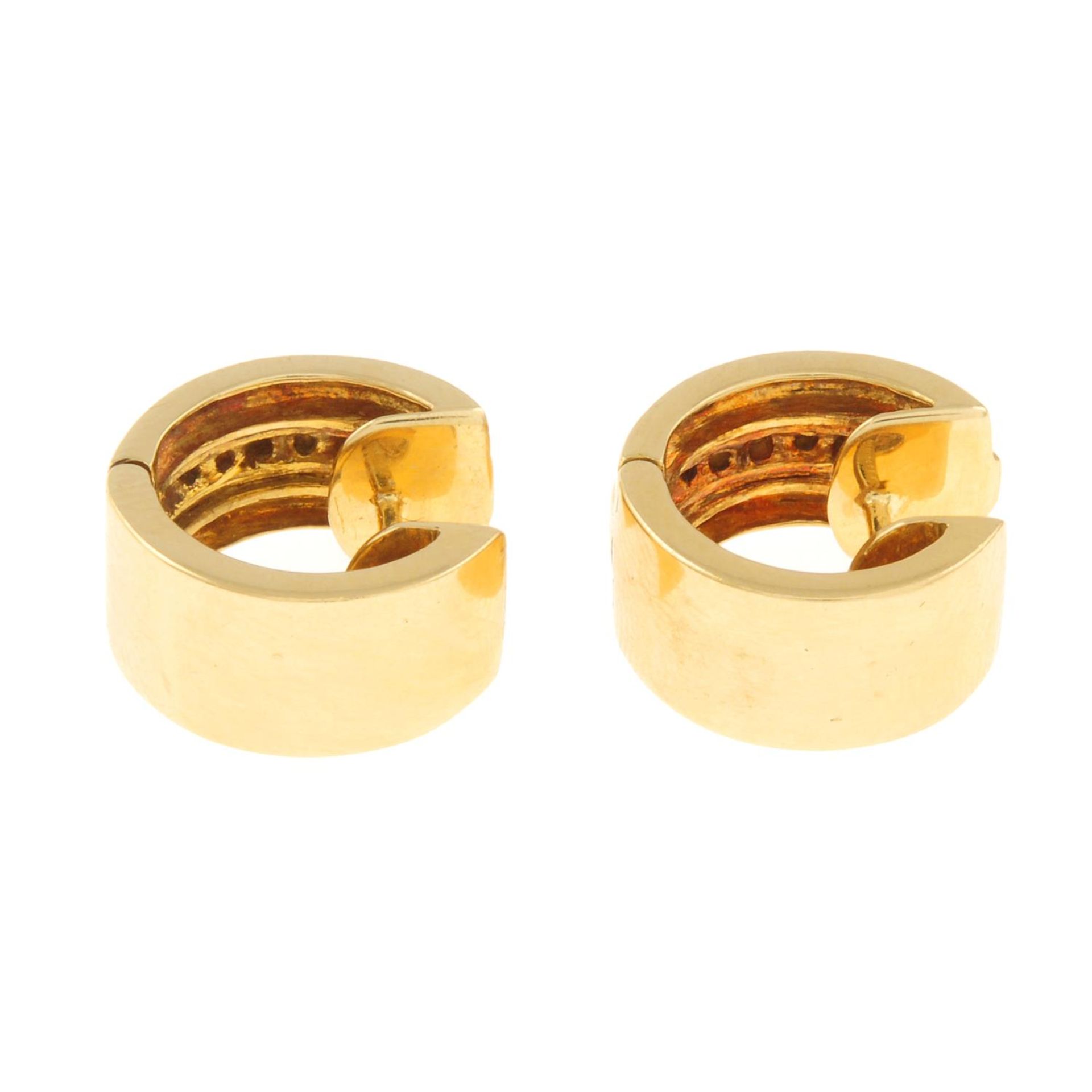 A pair of 18ct gold brilliant-cut diamond hoop earrings. - Image 3 of 4