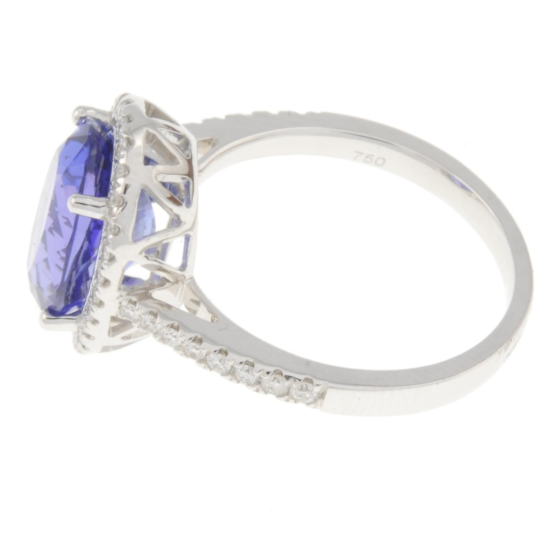 An 18ct gold tanzanite ring, with brilliant-cut diamond surround and sides. - Image 2 of 4