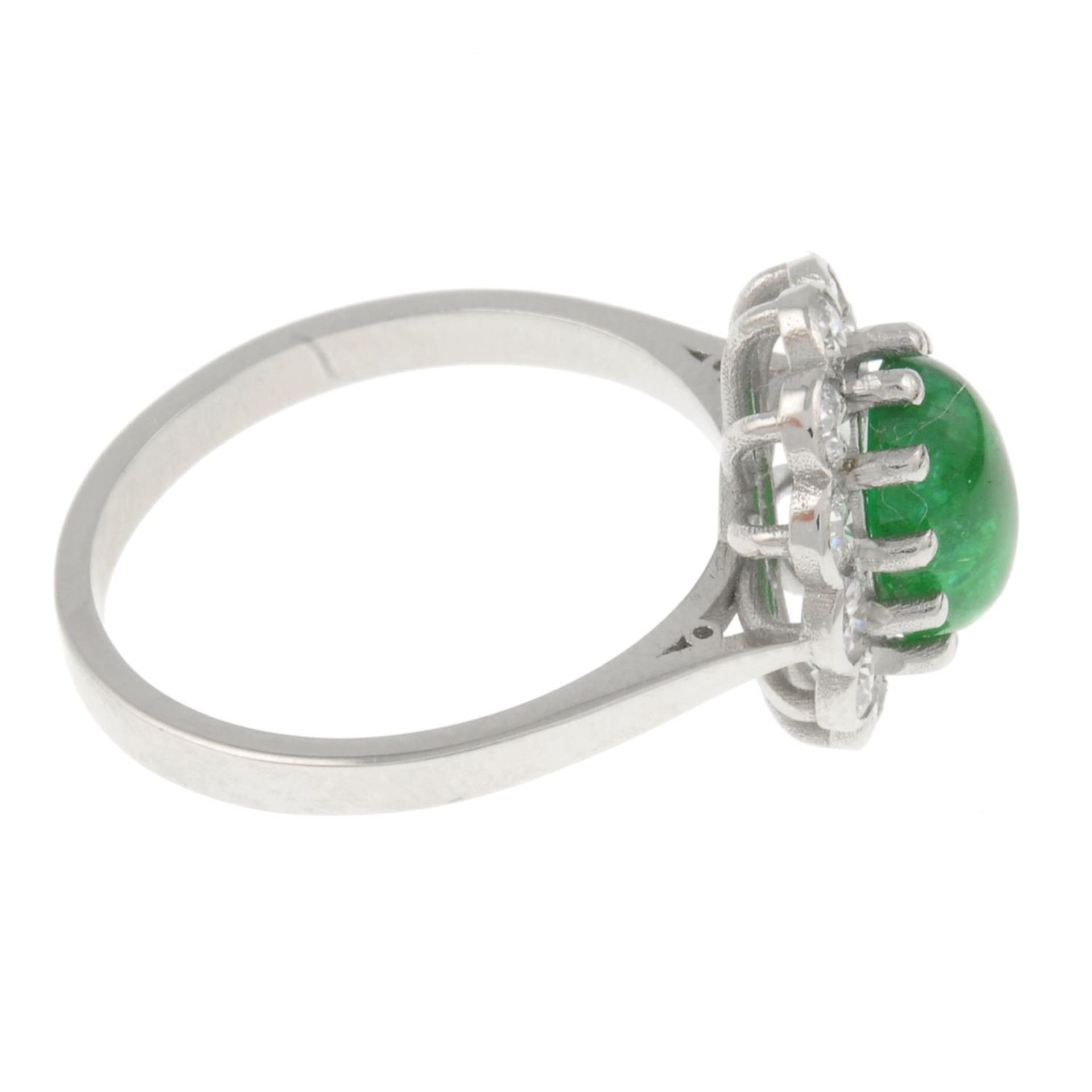 An emerald cabochon and brilliant-cut diamond cluster ring.Emerald calculated weight 1.57ct, - Image 3 of 4