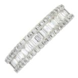 An 18ct gold baguette and brilliant-cut diamond dress ring.Total diamond weight 0.40ct,