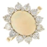 An opal cabochon and brilliant-cut diamond cluster ring.Estimated opal dimensions 10.4 by 8.4 by