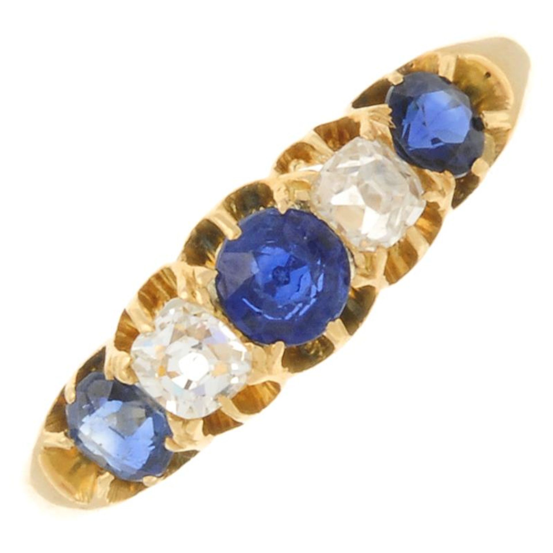 An early 20th century sapphire and old-cut diamond ring.Estimated total diamond weight 0.25ct,