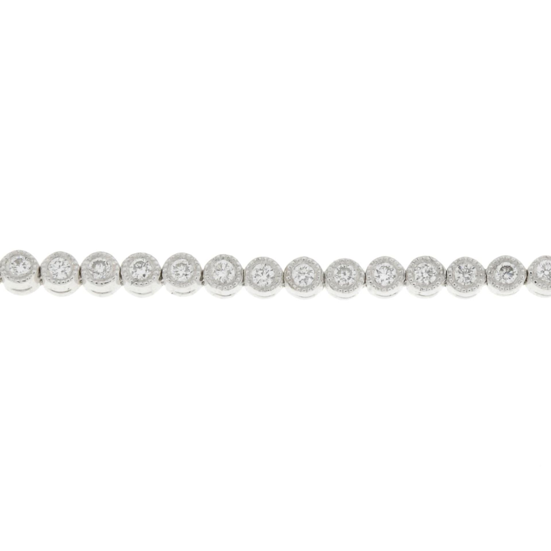 A brilliant-cut diamond line bracelet.