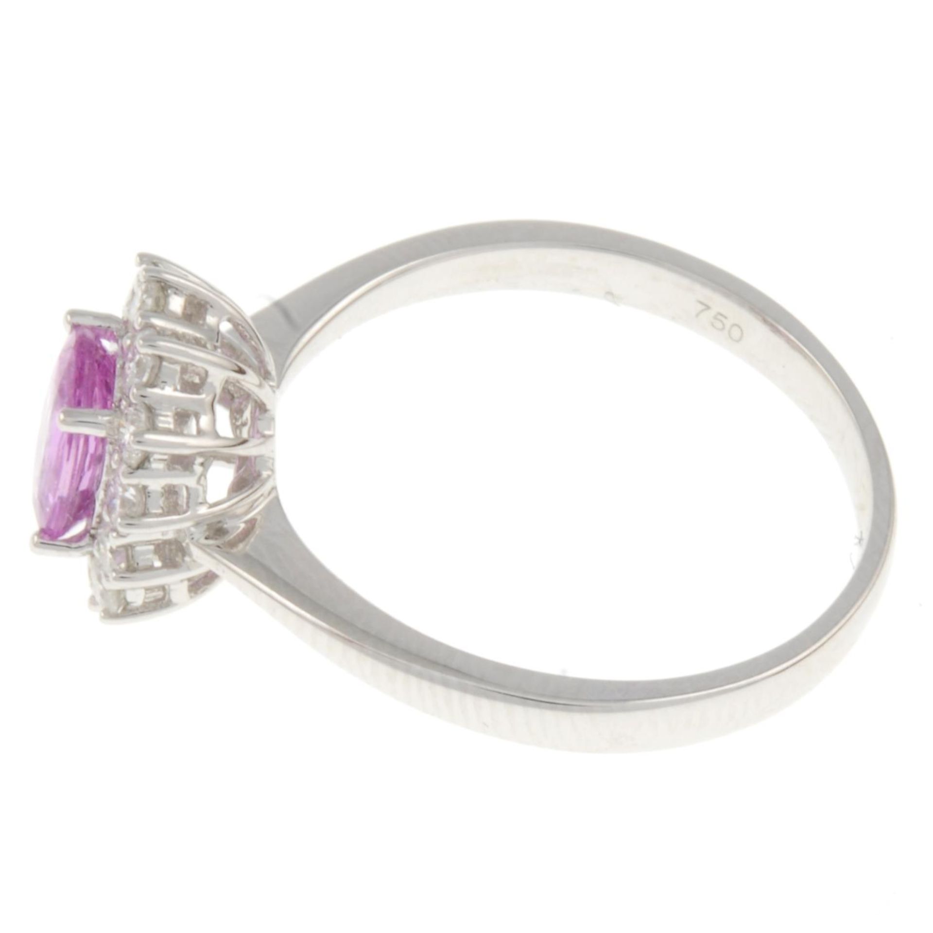 An 18ct gold pink sapphire and brilliant-cut diamond cluster ring.Sapphire weight 0.90ct.Total - Image 2 of 4