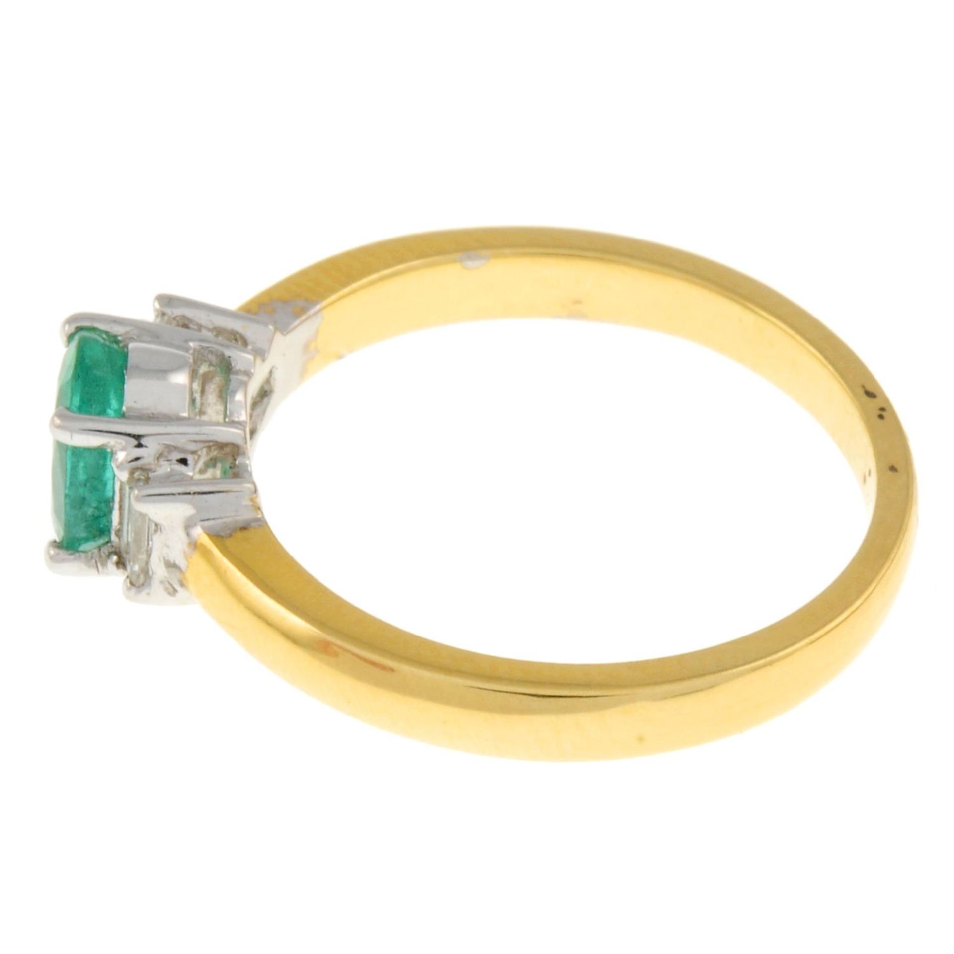 An 18ct gold emerald and baguette-cut diamond three-stone ring.Emerald calculated weight 0.65ct, - Image 2 of 4