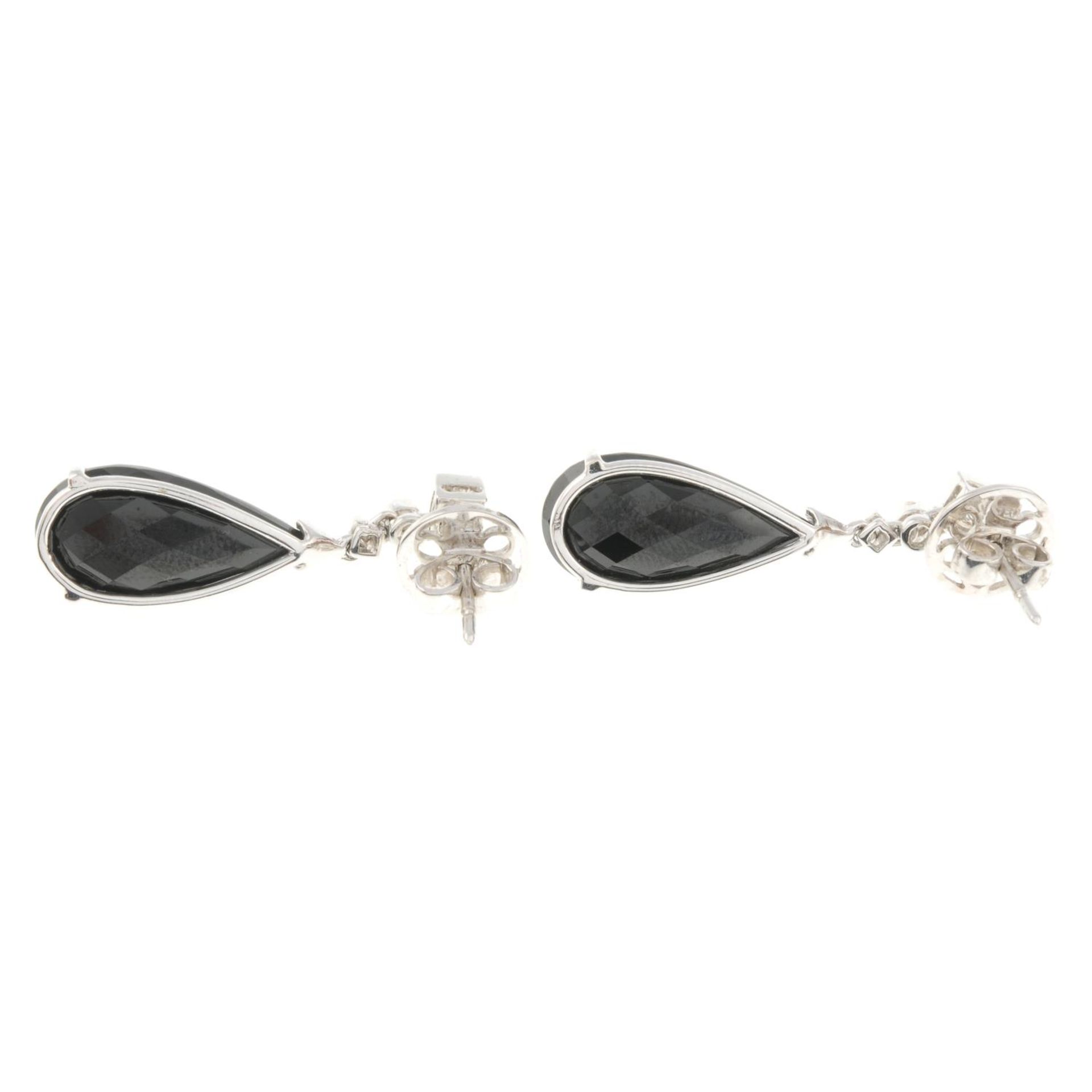 A pair of 18ct gold brilliant-cut diamond and onyx drop earrings. - Image 2 of 2