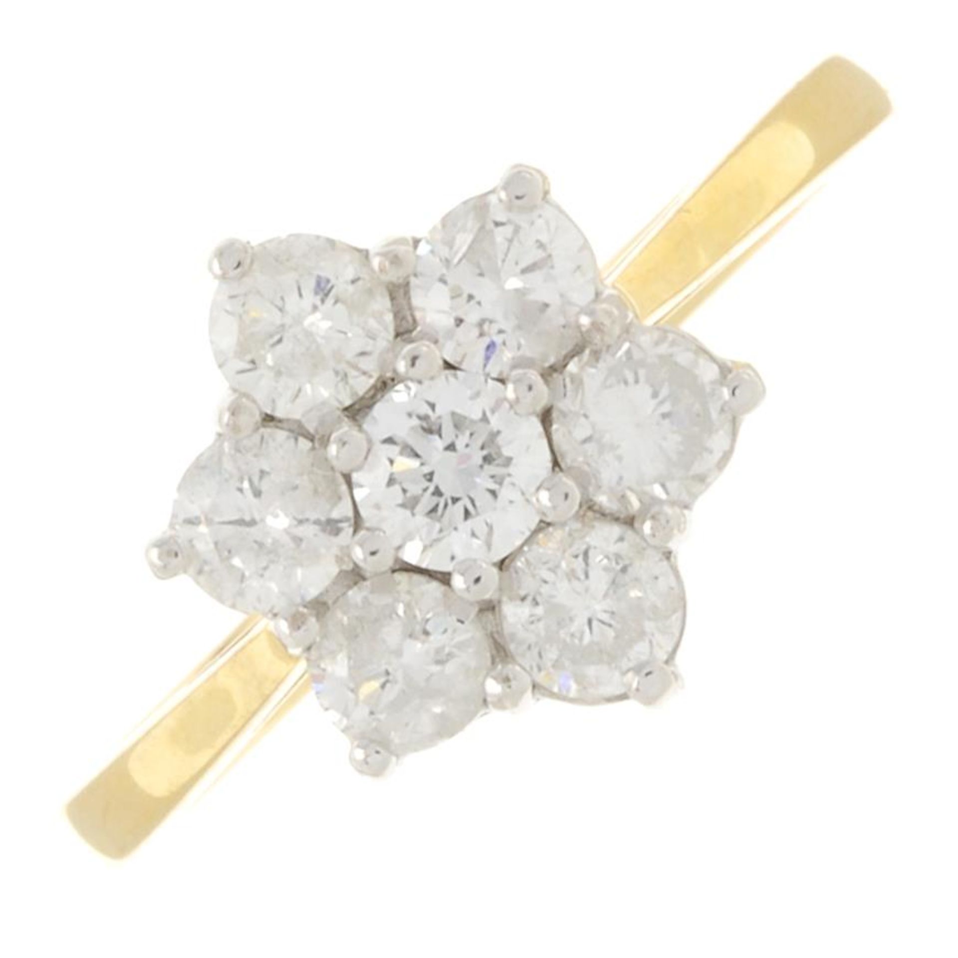 An 18ct gold brilliant-cut diamond cluster ring.Estimated total diamond weight 1.10cts,