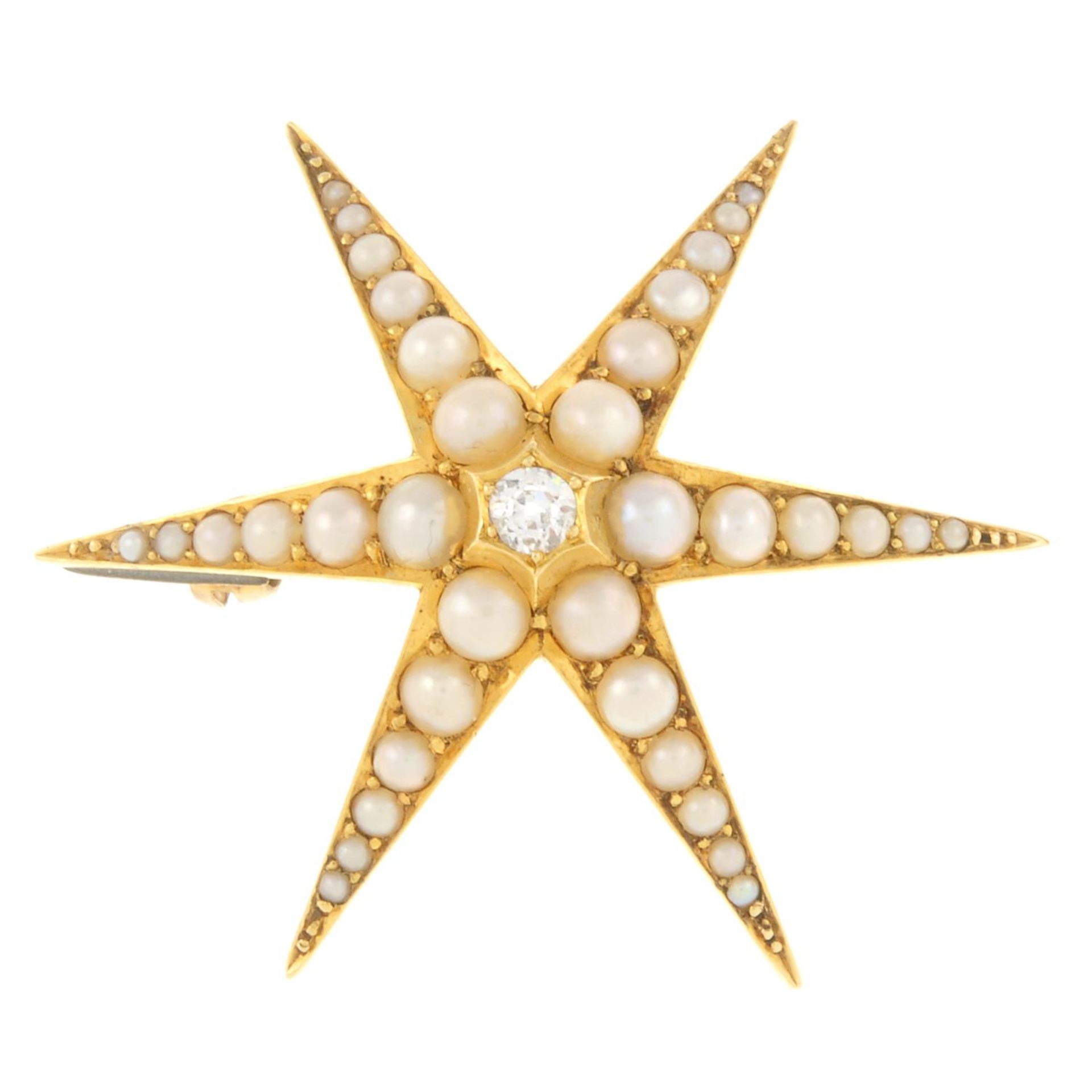 An early 20th century 18ct gold old-cut diamond and split pearl star brooch.Estimated diamond