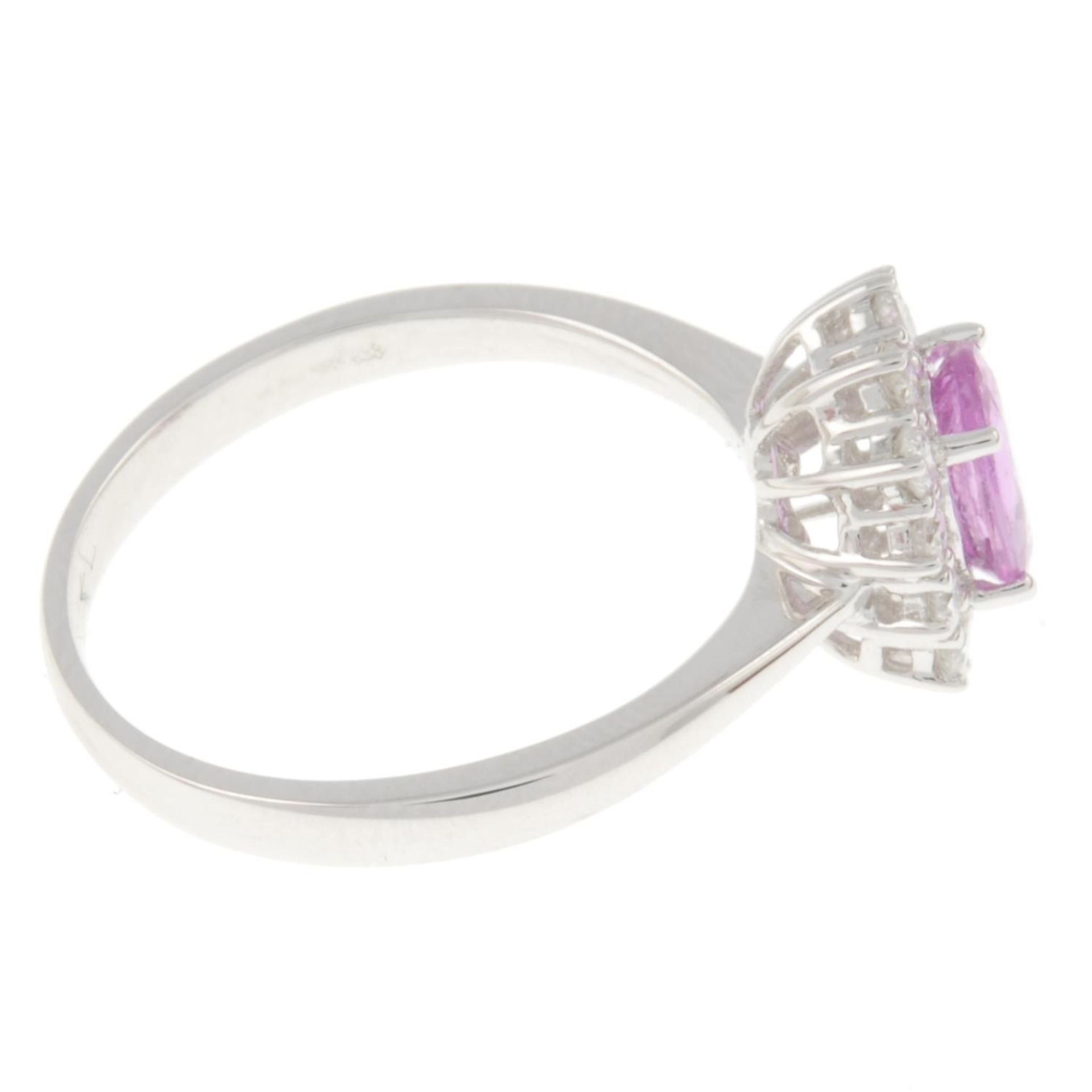 An 18ct gold pink sapphire and brilliant-cut diamond cluster ring.Sapphire weight 0.90ct.Total - Image 3 of 4