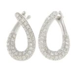 A pair of 18ct gold pave-set diamond curved hoop earrings.Makers marks for Alfred Terry.Total