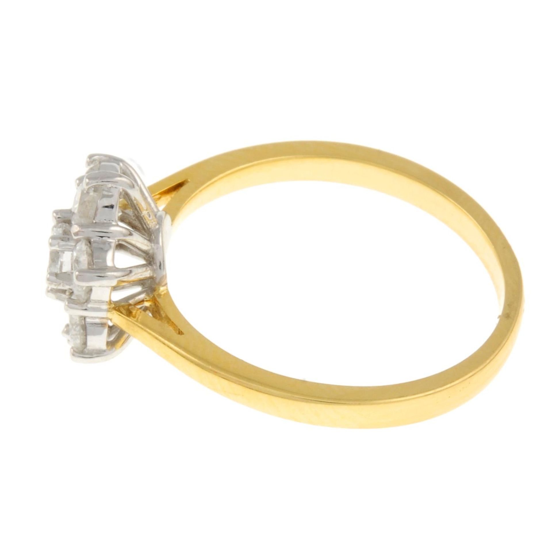 An 18ct gold brilliant-cut diamond cluster ring.Estimated total diamond weight 1.10cts, - Image 2 of 4