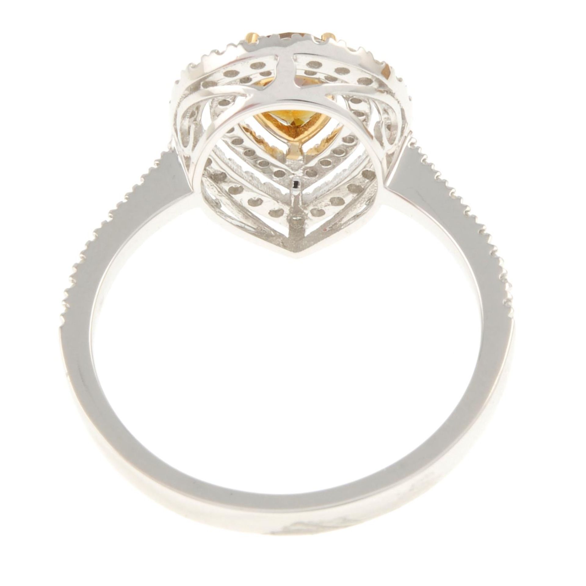 An 18ct gold pear-shape coloured diamond and brilliant-cut diamond cluster ring.Principal diamond - Image 4 of 4