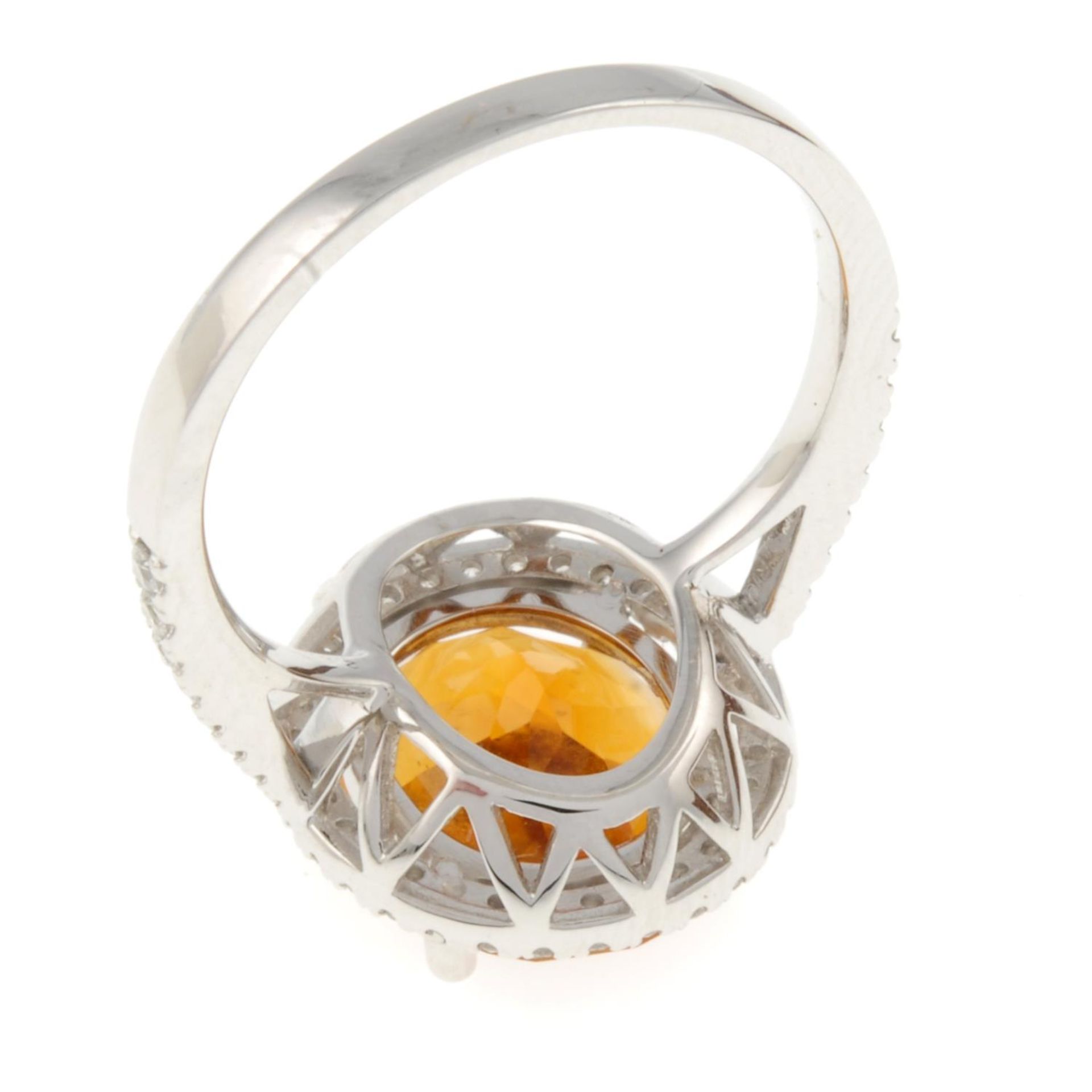 An 18ct gold citrine and brilliant-cut diamond cluster ring.Citrine weight 3.77cts.Total diamond - Image 4 of 4