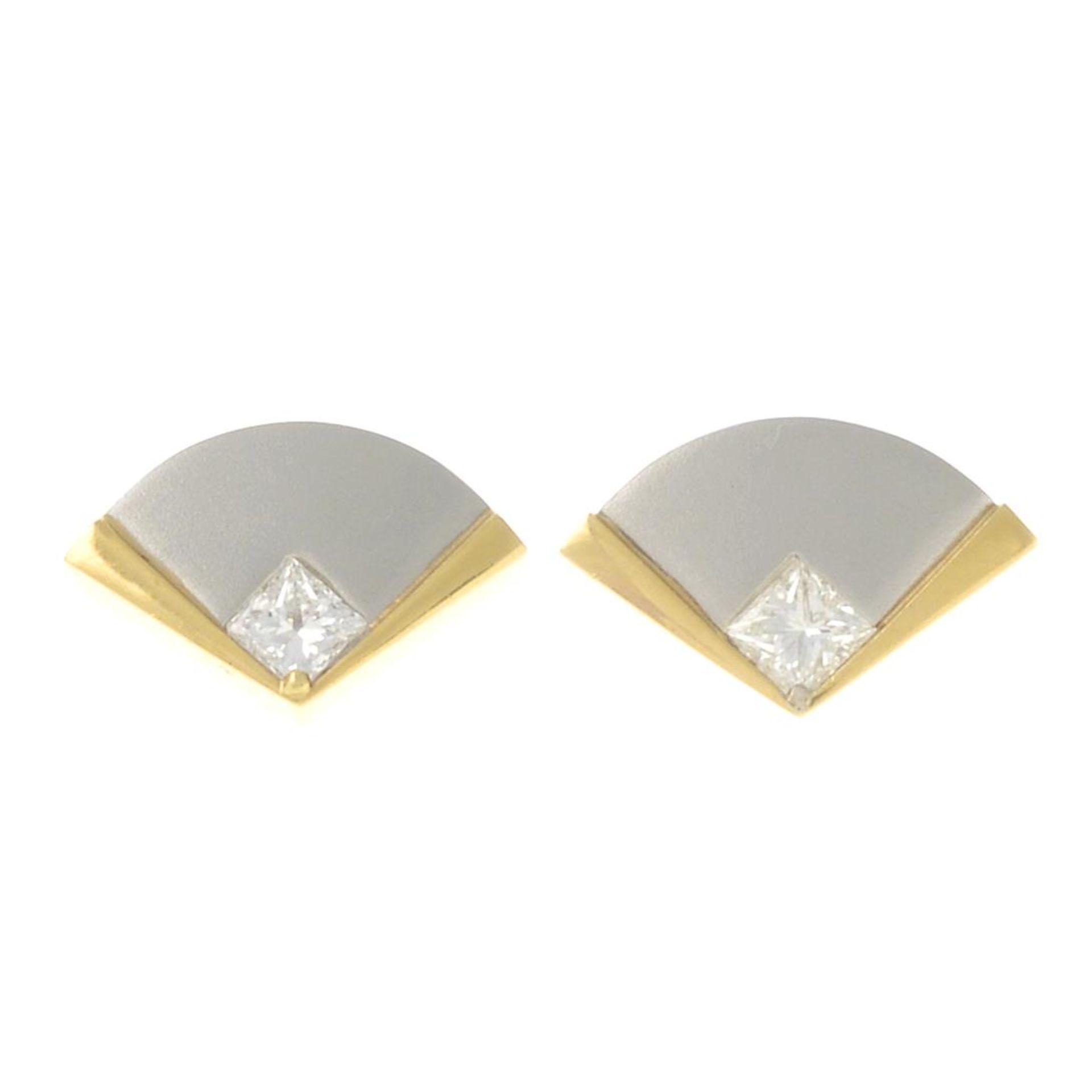 A pair of platinum square-shape diamond stylised fan bi-colour earrings.Estimated total diamond