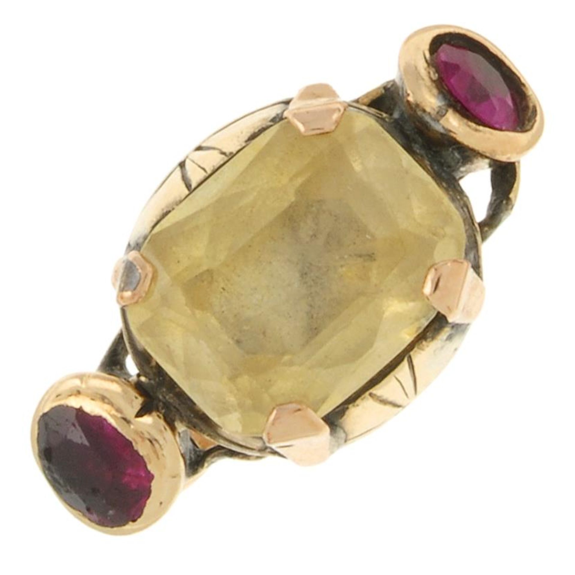 A 19th century yellow sapphire and ruby dress ring.Estimated sapphire dimensions 10.2 by