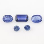 Five vari-shape blue sapphires, estimated total weight 6.64cts.