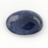 An oval shape blue sapphire cabochon, weighing 12.44ct.