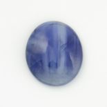 An oval blue sapphire cabochon.