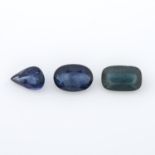 Three vari-shape blue sapphires weighing 3.89ct.