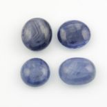 Four oval blue sapphire cabochons.