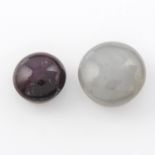 A circular shape star sapphire and a circular shape star ruby,