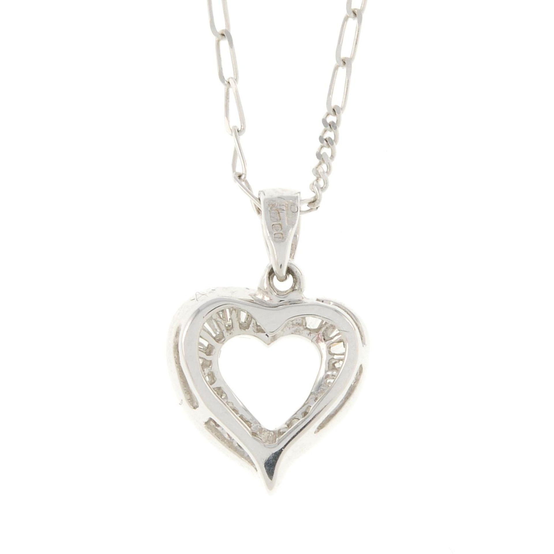 An 18ct gold diamond open heart pendant, with 18ct gold chain.Total diamond weight 0.33ct. - Image 2 of 2