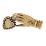 A Georgian gold mourning hand brooch.Length 2.3cms.