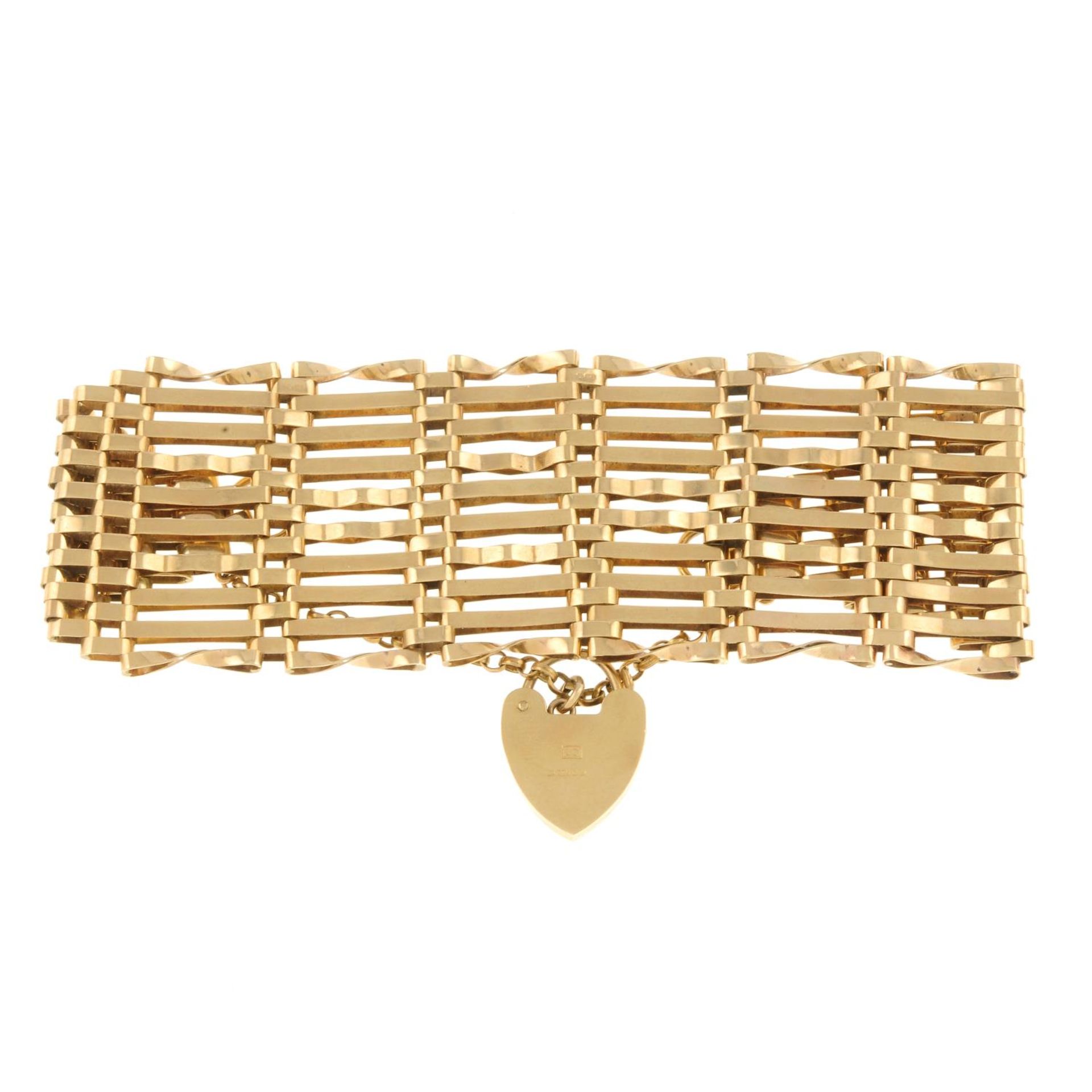 A gate bracelet, gathered at a 9ct gold padlock clasp.Clasp hallmarks for 9ct gold. - Image 2 of 2