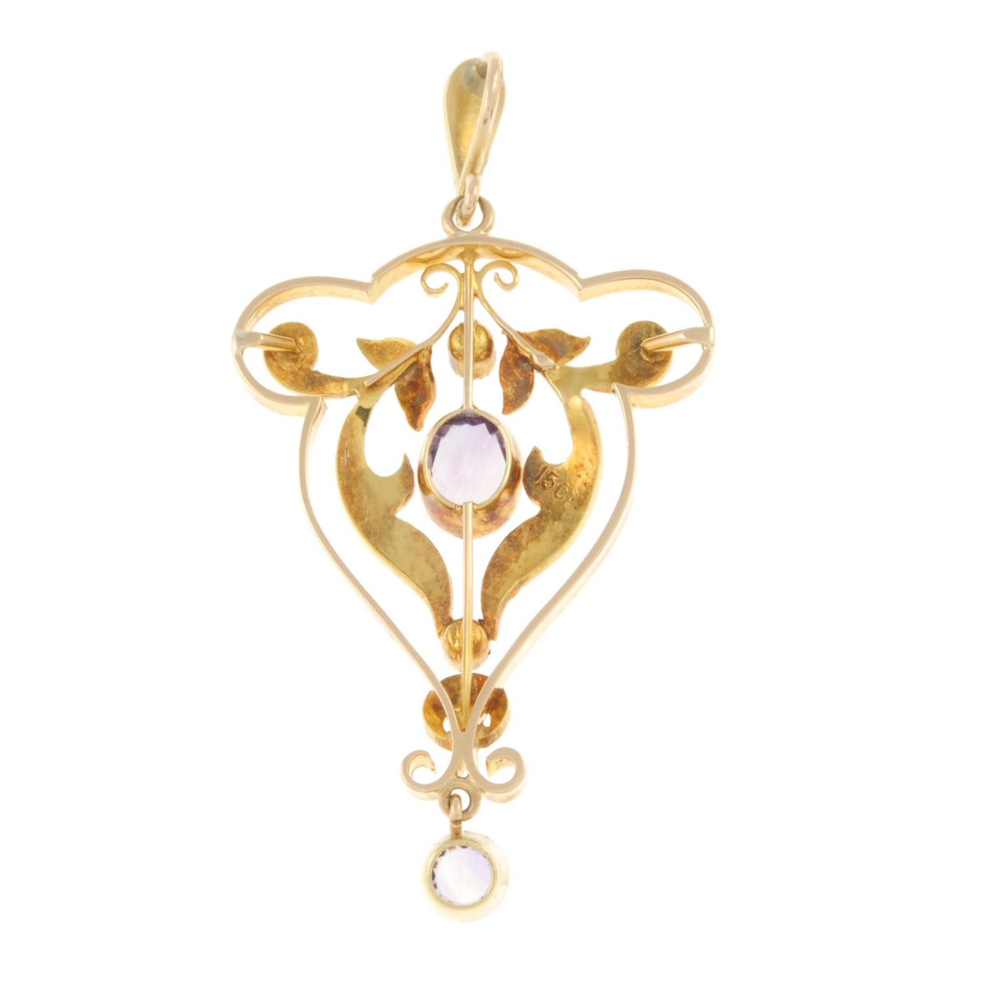 An early 20th century 15ct gold amethyst and split pearl pendant.Stamped 15ct.Length 5.2cms. - Image 2 of 2