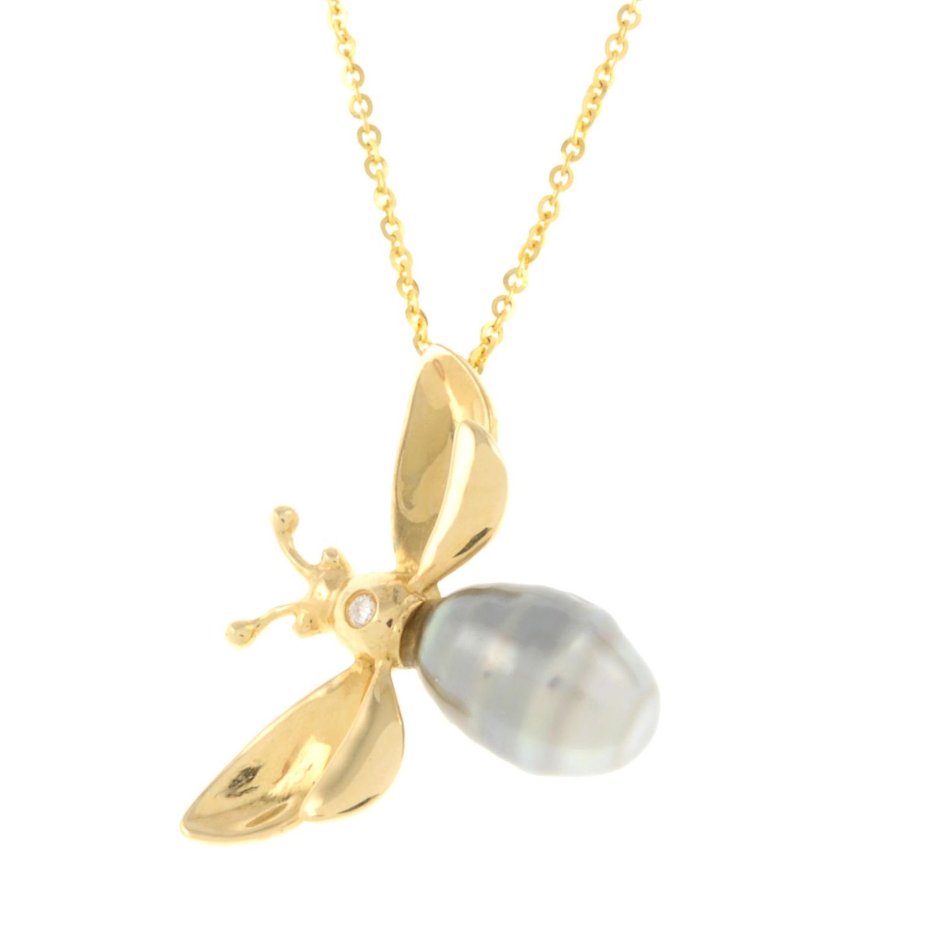An 18ct gold cultured pearl and diamond insect pedant,