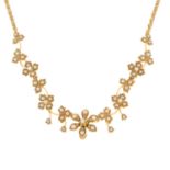 An early 20th century 15ct gold split pearl floral necklace.Stamped 15.