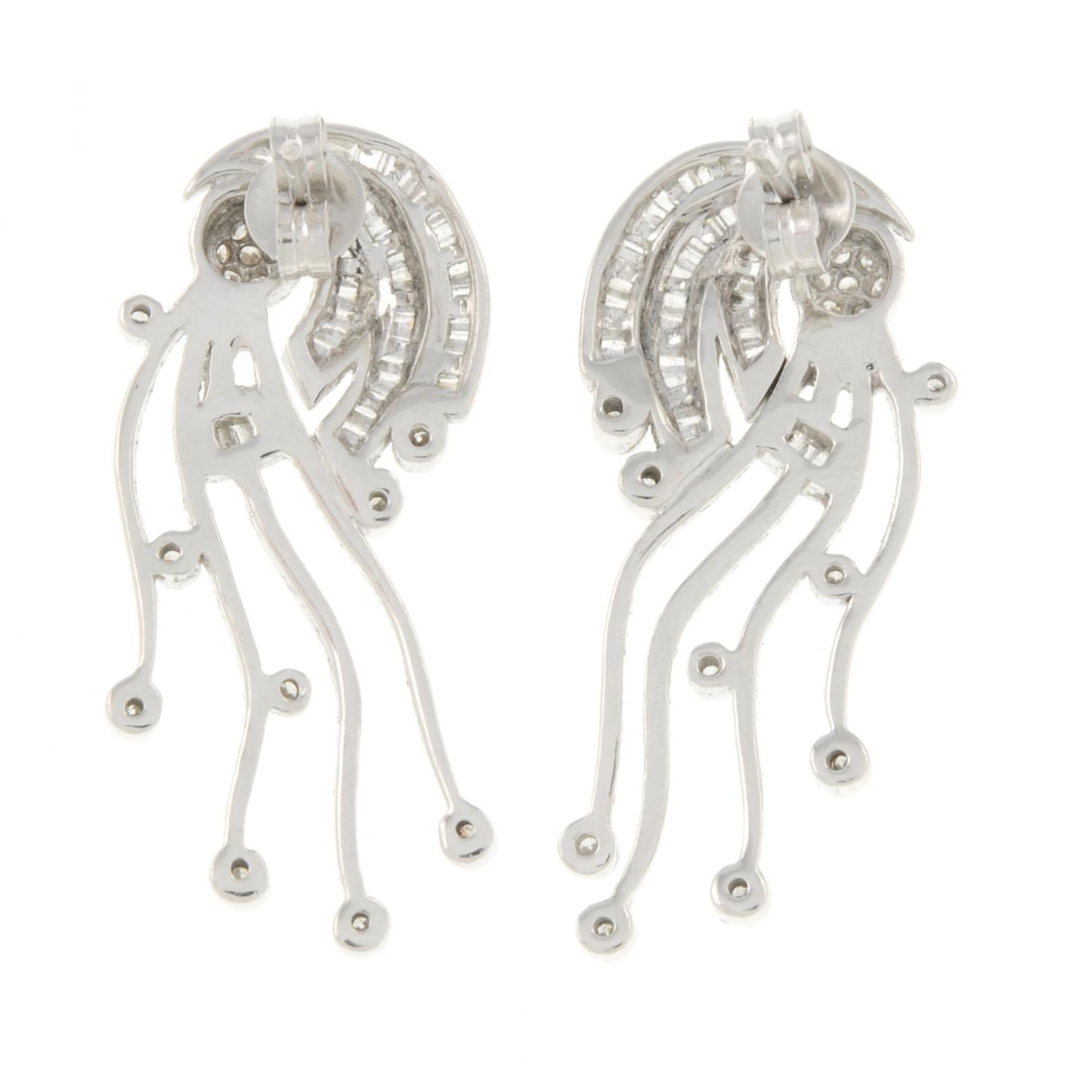 A pair of vari-cut diamond abstract earrings.Estimated total diamond weight 1.20cts. - Image 2 of 2