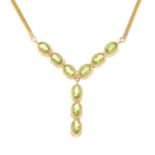 A 9ct gold peridot necklace.Hallmarks for Birmingham.Length 45cms.