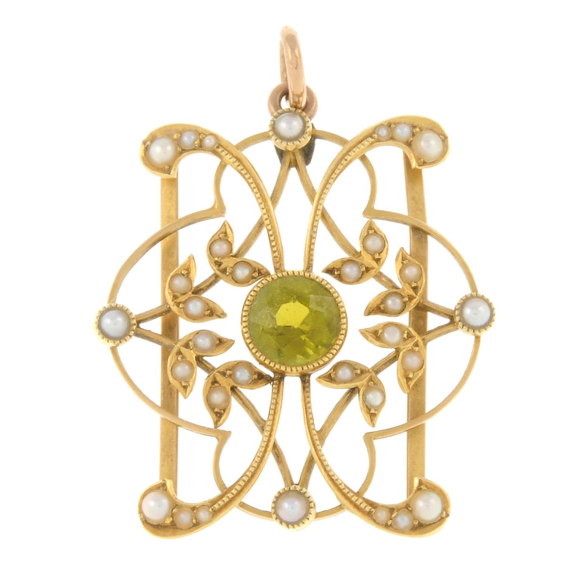 An early 20th century 15ct gold peridot and split pearl floral pendant.