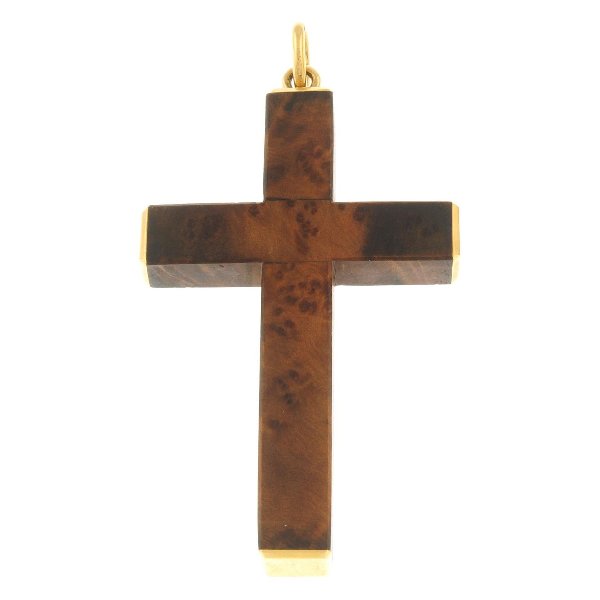 A wooden cross pendant, with polished terminals and surmount.Surmount with foreign marks. - Image 2 of 2