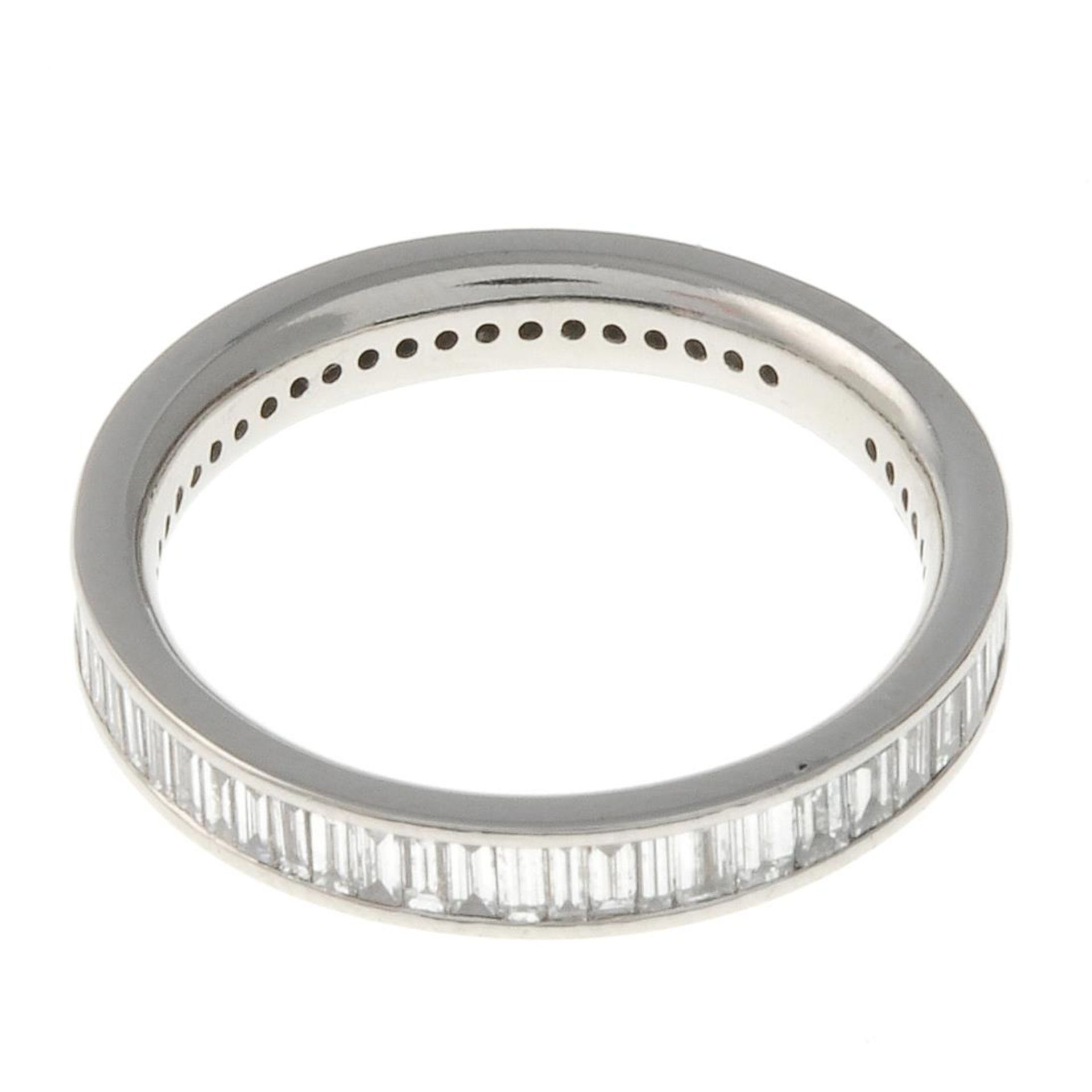 A platinum baguette-cut diamond full eternity ring.Estimated total diamond weight 1ct.Hallmarks for - Image 3 of 3