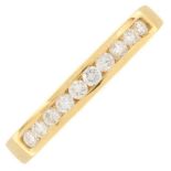 A brilliant-cut diamond half eternity ring.Estimated total diamond weight 0.30ct.Stamped 750.Ring