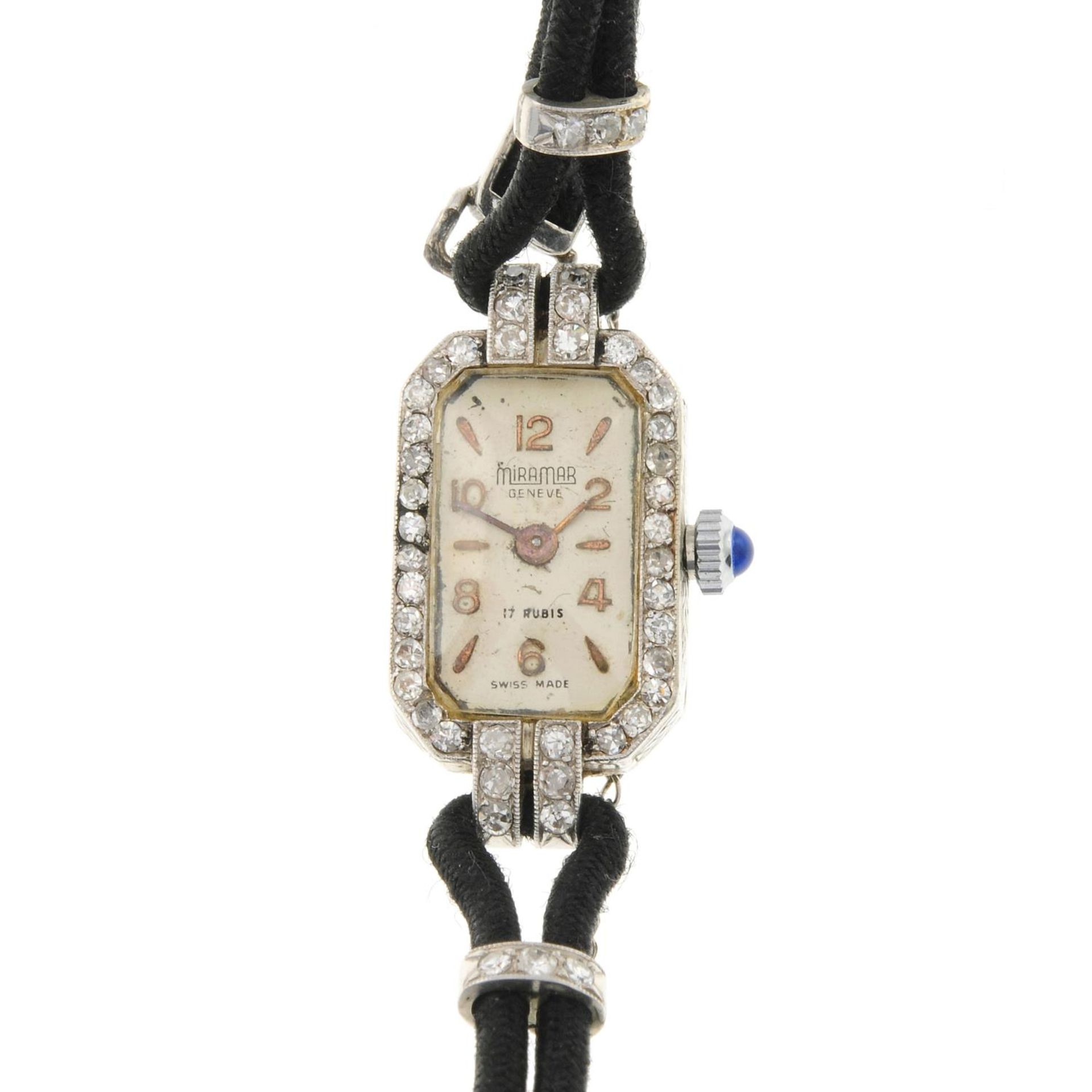 A lady's mid 20th century 18ct gold diamond bezel wrist watch,