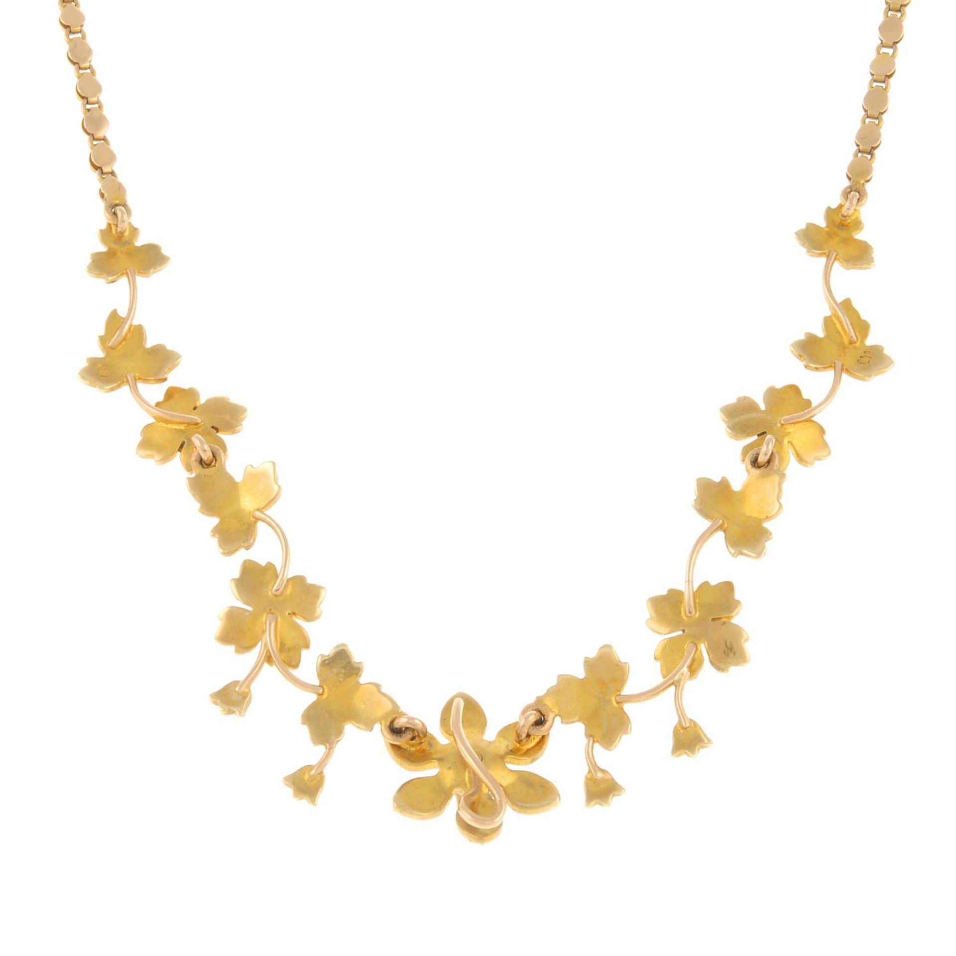 An early 20th century 15ct gold split pearl floral necklace.Stamped 15. - Image 2 of 2