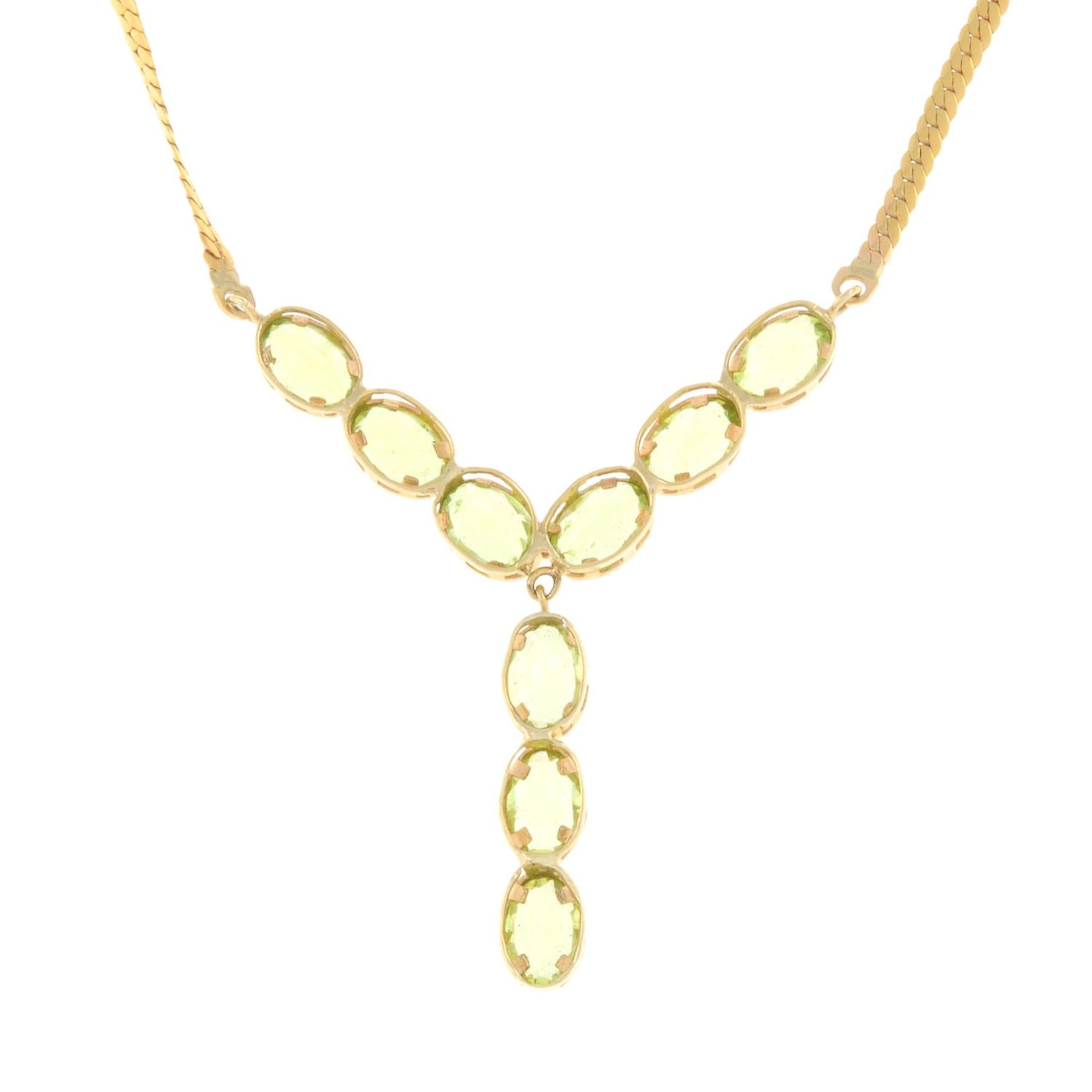 A 9ct gold peridot necklace.Hallmarks for Birmingham.Length 45cms. - Image 2 of 2