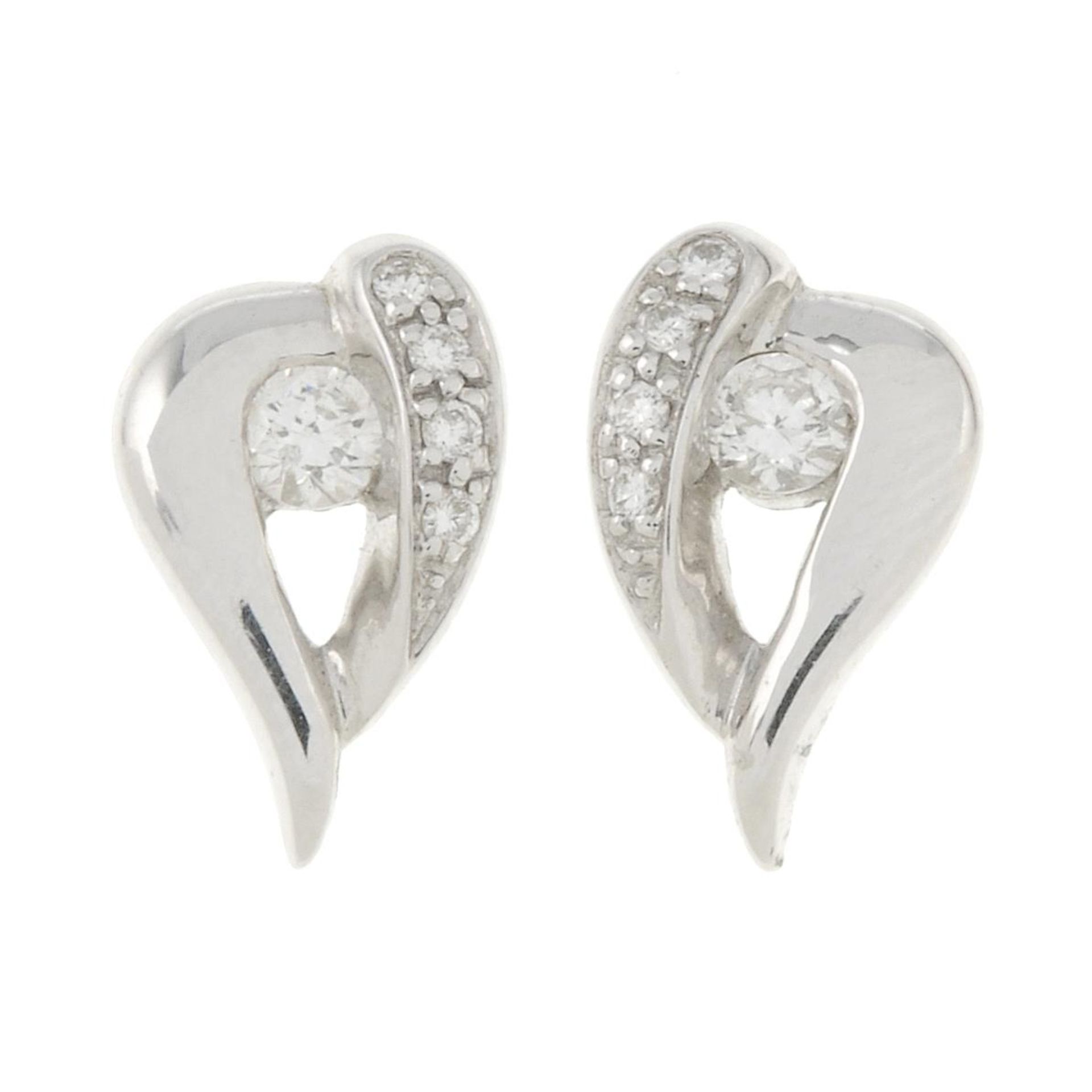 A pair of 18ct gold diamond heart earrings.Estimated total diamond weight 0.25ct.