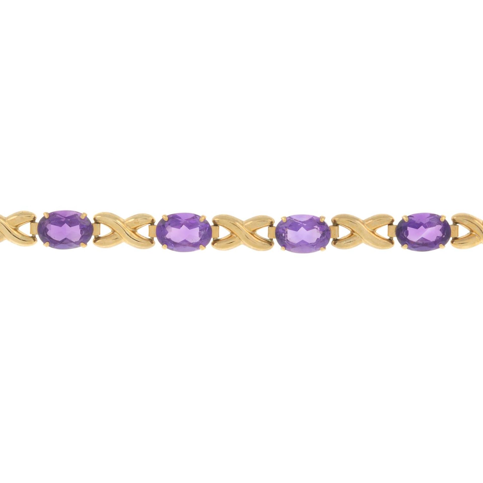 A 9ct gold amethyst bracelet.Hallmarks for Birmingham.Length 19cms.