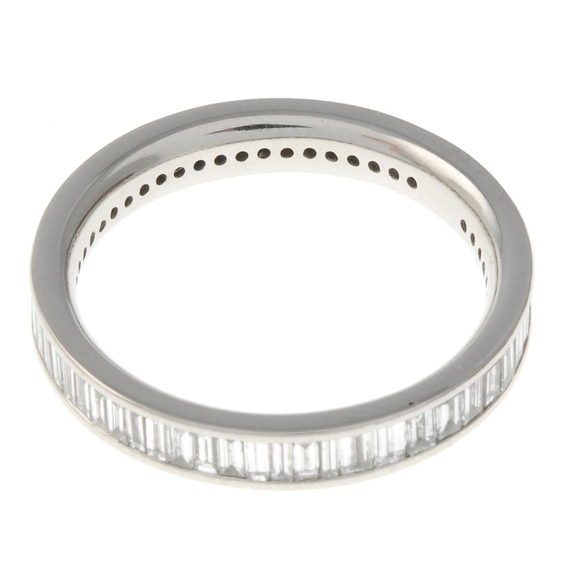 A platinum baguette-cut diamond full eternity ring.Estimated total diamond weight 1ct.Hallmarks for - Image 2 of 3