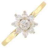 An 18ct gold diamond cluster ring.Estimated total diamond weight 0.25ct.